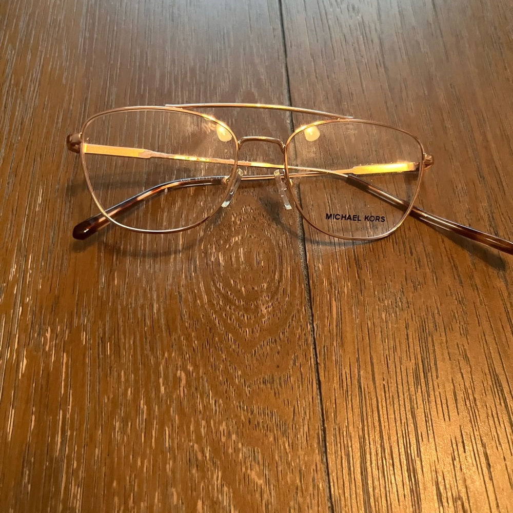 Gentle used Michael Kors glasses
